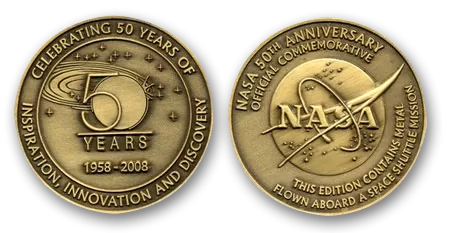 Commemorative coins, containing metal from the Space Shuttle, marking NASA’s 50th Anniversary